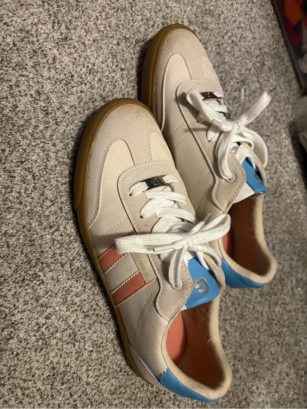 Guess women’s size 9. Cream Retro Sneaker with Blue & Coral Accents